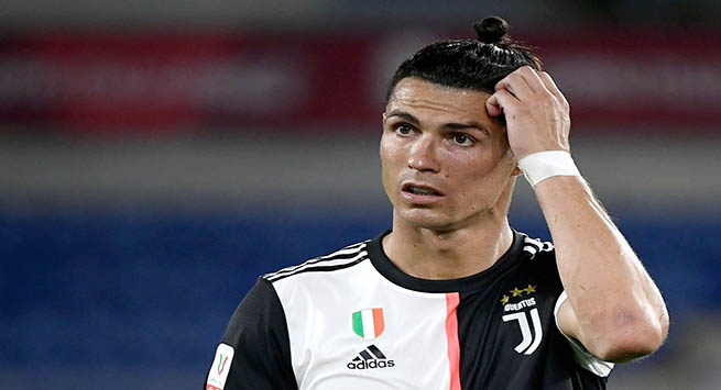 TOPSHOT - Juventus' Portuguese forward Cristiano Ronaldo reacts during the TIM Italian Cup (Coppa Italia) final football match Napoli vs Juventus on June 17, 2020 at the Olympic stadium in Rome, played behind closed doors as the country gradually eases the lockdown aimed at curbing the spread of the COVID-19 infection, caused by the novel coronavirus. (Photo by Filippo MONTEFORTE / AFP) (Photo by FILIPPO MONTEFORTE/AFP via Getty Images)