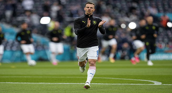 Czech Republic player Vladimir Darida warms up prior the Euro 2020 soccer championship group D match between Scotland and Czech Republic, at Hampden Park stadium in Glasgow, Scotland, Monday, June 14, 2021. (AP Photo/Petr David Josek, Pool)