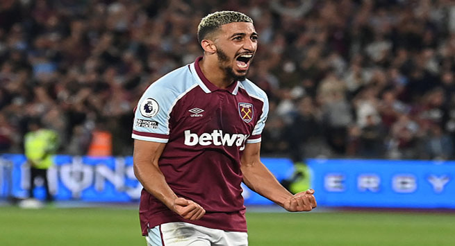 West Ham United's Algerian midfielder Said Benrahma celebrates after scoring their second goal during the English Premier League football match between West Ham United and Leicester City at The London Stadium, in east London on August 23, 2021. - RESTRICTED TO EDITORIAL USE. No use with unauthorized audio, video, data, fixture lists, club/league logos or 'live' services. Online in-match use limited to 120 images. An additional 40 images may be used in extra time. No video emulation. Social media in-match use limited to 120 images. An additional 40 images may be used in extra time. No use in betting publications, games or single club/league/player publications. (Photo by Glyn KIRK / AFP) / RESTRICTED TO EDITORIAL USE. No use with unauthorized audio, video, data, fixture lists, club/league logos or 'live' services. Online in-match use limited to 120 images. An additional 40 images may be used in extra time. No video emulation. Social media in-match use limited to 120 images. An additional 40 images may be used in extra time. No use in betting publications, games or single club/league/player publications. / RESTRICTED TO EDITORIAL USE. No use with unauthorized audio, video, data, fixture lists, club/league logos or 'live' services. Online in-match use limited to 120 images. An additional 40 images may be used in extra time. No video emulation. Social media in-match use limited to 120 images. An additional 40 images may be used in extra time. No use in betting publications, games or single club/league/player publications. (Photo by GLYN KIRK/AFP via Getty Images)