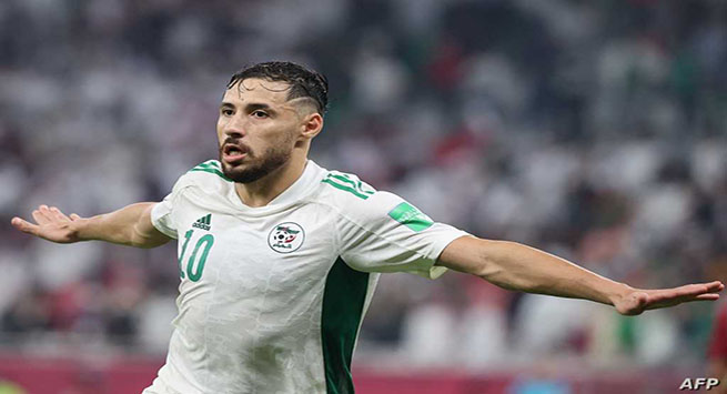 Algeria's forward Youcef Belaili celebrates after scoring the second goal during the FIFA Arab Cup 2021 semi-final football match between Qatar and Algeria at the Al-Thumama stadium in the Qatari capital of Doha on December 15, 2021. (Photo by KARIM JAAFAR / AFP)