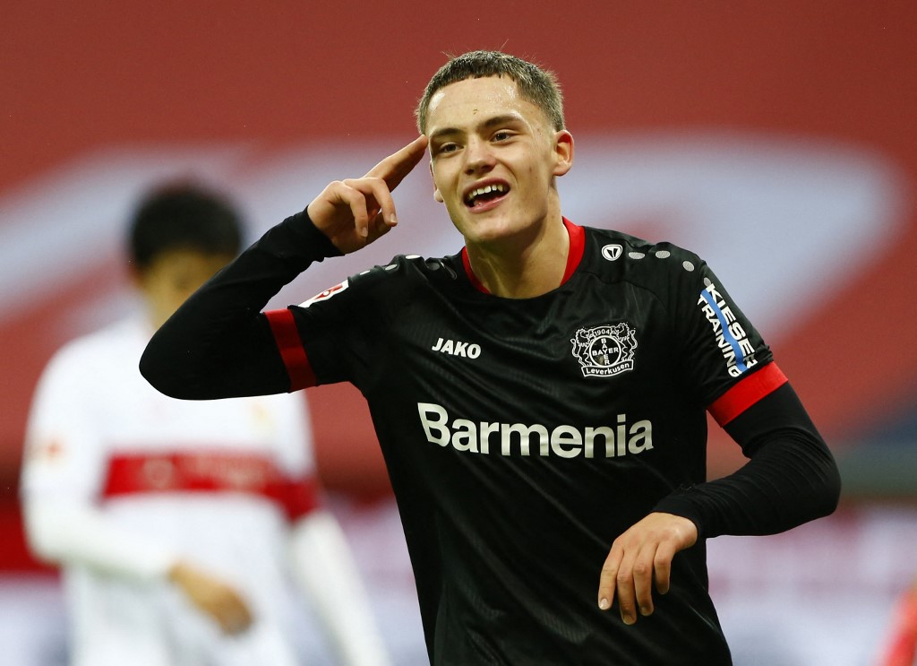 Leverkusen's German forward Florian Wirtz celebrates scoring the team's fourth goal during the German first division Bundesliga football match between Bayer 04 Leverkusen and VfB Stuttgart in Leverkusen, western Germany, on February 6, 2021. (Photo by THILO SCHMUELGEN / POOL / AFP) / DFL REGULATIONS PROHIBIT ANY USE OF PHOTOGRAPHS AS IMAGE SEQUENCES AND/OR QUASI-VIDEO