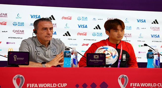 Soccer Football - FIFA World Cup Qatar 2022 - South Korea Press Conference - Main Media Center, Doha, Qatar - December 4, 2022 South Korea coach Paulo Bento and Kim Jin-su during the press conference REUTERS/Gareth Bumstead