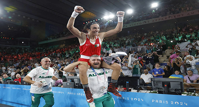 Paris 2024 Olympics - Boxing - Women's 66kg - Final - Roland-Garros Stadium, Paris, France - August 09, 2024. Imane Khelif of Algeria celebrates winning against Liu Yang of China. REUTERS/Peter Cziborra