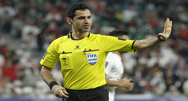 Qatari match referee Abdulrahman al-Jassim gestures during the Qatar 2023 AFC Asian Cup Group C football match between Iran and Palestine at the Education City Stadium in Al-Rayyan, west of Doha on January 14, 2024. (Photo by KARIM JAAFAR / AFP) (Photo by KARIM JAAFAR/AFP via Getty Images)