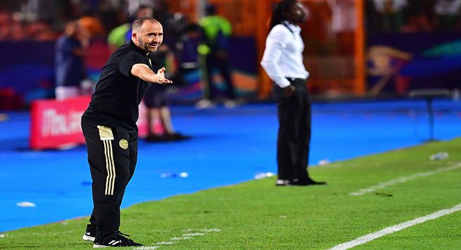 Algeria's coach Djamel Belmadi (L) gives his instructions during the 2019 Africa Cup of Nations (CAN) Final football match between Senegal and Algeria at the Cairo International Stadium in Cairo on July 19, 2019. (Photo by Giuseppe CACACE / AFP)        (Photo credit should read GIUSEPPE CACACE/AFP/Getty Images)
