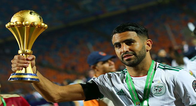 Riyad Mahrez of Algeria with the trophy after the Final of 2019 African Cup of Nations match between Algeria and Senegal at the Cairo International Stadium in Cairo, Egypt on July 19, 2019. (Photo by Ahmed Awaad/NurPhoto via Getty Images)